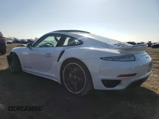 2015 Porsche 911 Turbo S with VIN WP0AD2A9XFS160370, listed as a Copart auction lot 77165054 with 19,235 mi miles and Salvage Title. Bid and sale history available at DreamBid. Image 2.