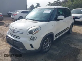 2014 FIAT 500L Trekking with VIN ZFBCFADHXEZ009425, listed as a IAAI auction lot 41465119 with 114,029 mi miles and . Bid and sale history available at DreamBid. Image 2.