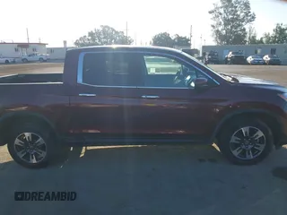 2018 Honda Ridgeline RTL-E with VIN 5FPYK3F75JB007846, listed as a IAAI auction lot 42301480 with 75,820 mi miles and . Bid and sale history available at DreamBid. Image 14.