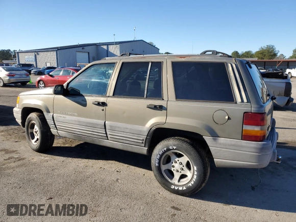 1997 Jeep Grand Cherokee TSi with VIN 1J4FX58S4VC516340, listed as a Copart auction lot 84409044 with 256,300 mi miles and Clean Title. Bid and sale history available at carsss.com. Image 2.