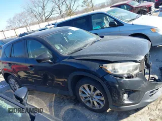 2013 Mazda CX-5 Grand Touring with VIN JM3KE2DE1D0164723, listed as a IAAI auction lot 41364590 with 227,932 mi miles. Bid and sale history available at carsss.com. Image 14.