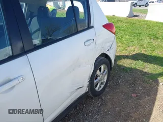 2012 Nissan Versa S with VIN 3N1BC1CPXCK212600, listed as a IAAI auction lot 41918424 with 104,483 mi miles. Bid and sale history available at carsss.com. Image 6.