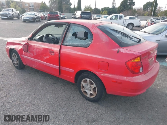 2003 Hyundai Accent GL z VIN KMHCG35C23U238969, wystawiony jako IAAI lot #41462884 z przebiegiem 156 682 mil mil oraz . Historia ofert i sprzedaży dostępna na DreamBid. Obrazek 3.