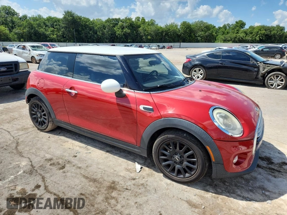 2015 MINI Hardtop with VIN WMWXM5C59FT939742, listed as a Copart auction lot 63778555 with 110,428 mi miles and Salvage title. Bid and sale history available at DreamBid. Image 4.