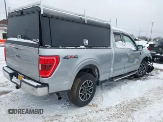 2021 Ford F-150 XL with VIN 1FTFX1E54MFC43510, listed as a IAAI auction lot 41251459 with 15,391 mi miles and . Bid and sale history available at DreamBid. Image 4.