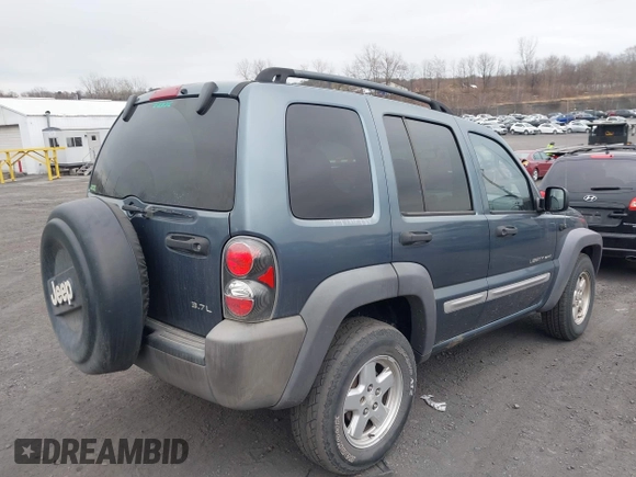 2002 Jeep Liberty Sport with VIN 1J8GL48K62W298212, listed as a IAAI auction lot 41918130 with 226,299 mi miles. Bid and sale history available at carsss.com. Image 4.