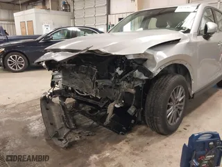 2017 Mazda CX-5 Sport with VIN JM3KFBBL1H0116157, listed as a IAAI auction lot 41584679 with 92,325 mi miles. Bid and sale history available at carsss.com. Image 6.