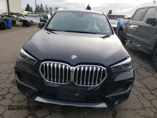 2020 BMW X1 xDrive28i with VIN WBXJG9C02L5P82408, listed as a Copart auction lot 43805615 with 23,111 mi miles and Salvage Title. Bid and sale history available at carsss.com. Image 5.