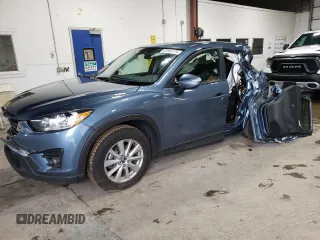 2016 Mazda CX-5 Touring with VIN JM3KE4CY8G0911228, listed as a Copart auction lot 61544774 with 0 mi miles and Salvage Title. Bid and sale history available at carsss.com. Image 1.