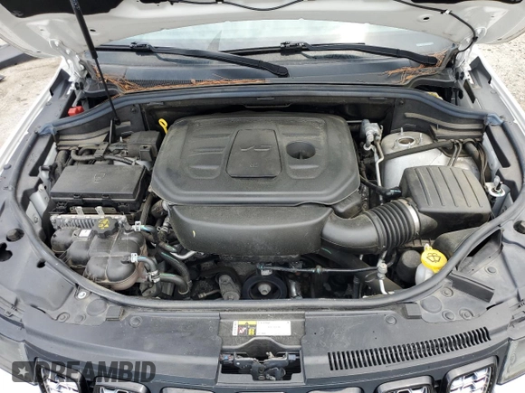 2021 Jeep Grand Cherokee Laredo X with VIN 1C4RJFAG1MC580981, listed as a Copart auction lot 58090225 with 71,942 mi miles and Salvage title. Bid and sale history available at DreamBid. Image 12.