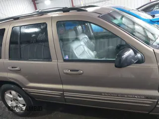 2001 Jeep Grand Cherokee Limited with VIN 1J4GW58N51C581743, listed as a IAAI auction lot 41768215 with 195,862 mi miles. Bid and sale history available at carsss.com. Image 13.