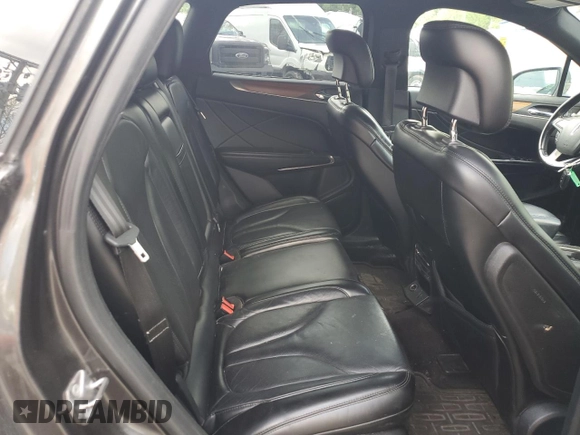 2017 Lincoln MKC Reserve с VIN 5LMCJ3D95HUL62861, выставлен на аукционе Copart как лот 55234305 с пробегом 138 663 миль миль и Списание • Salvage title. История ставок и продаж доступна на DreamBid. Изображение 11.