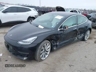 2018 Tesla Model 3 Long Range Battery with VIN 5YJ3E1EB9JF188437, listed as a IAAI auction lot 41371254 with 55,934 mi miles and . Bid and sale history available at DreamBid. Image 17.
