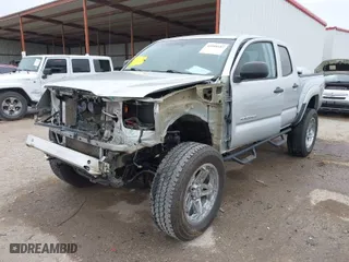 2011 Toyota Tacoma with VIN 3TMLU4ENXBM057058, listed as a IAAI auction lot 41088682 with 187,596 mi miles. Bid and sale history available at carsss.com. Image 2.
