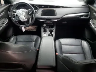 2020 Cadillac XT4 AWD Premium Luxury z VIN 1GYFZDR41LF025434, wystawiony jako Copart lot #55169805 z przebiegiem Nie podano mil oraz Szkoda całkowita • Salvage title. Historia ofert i sprzedaży dostępna na DreamBid. Obrazek 8.