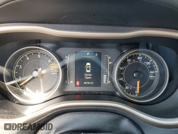 2016 Jeep Cherokee 75th Anniversary with VIN 1C4PJLCB6GW291038, listed as a Copart auction lot 43710965 with 96,784 mi miles and Salvage Title. Bid and sale history available at DreamBid. Image 9.