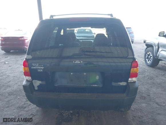 2004 Ford Escape XLT with VIN 1FMYU93194KA77634, listed as a IAAI auction lot 41663464 with 149,600 mi miles. Bid and sale history available at carsss.com. Image 16.