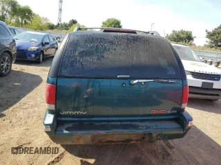 1996 GMC Jimmy SL with VIN 1GKCS13W0T2553905, listed as a Copart auction lot 71007674 with 169,513 mi miles and Salvage Title. Bid and sale history available at carsss.com. Image 6.