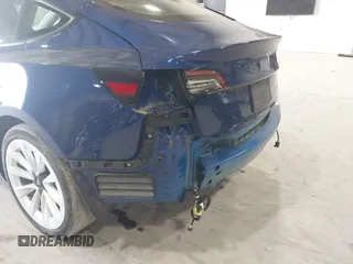 2022 Tesla Model 3 Long Range with VIN 5YJ3E1EB8NF255163, listed as a IAAI auction lot 42105451 with 40,166 mi miles and . Bid and sale history available at DreamBid. Image 20.