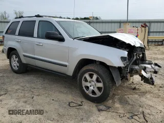 2009 Jeep Grand Cherokee Laredo with VIN 1J8GR48K89C500719, listed as a Copart auction lot 51425085 with 127,896 mi miles and Salvage Title. Bid and sale history available at carsss.com. Image 4.