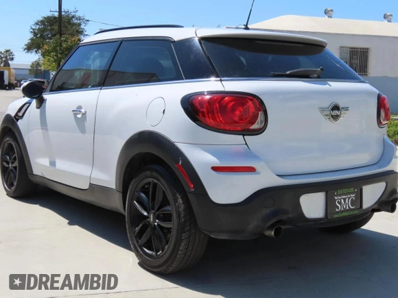 2015 MINI Paceman S with VIN WMWSS7C54FWS44675, listed as a Copart auction lot 54445575 with 77,663 mi miles and Clean Title. Bid and sale history available at DreamBid. Image 4.