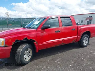 2006 Dodge Dakota SLT with VIN 1D7HW48N66S639608, listed as a IAAI auction lot 42201208 with 145,303 mi miles and . Bid and sale history available at carsss.com. Image 6.