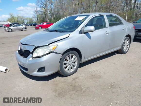 2009 Toyota Corolla with VIN 2T1BU40E69C142856, listed as a IAAI auction lot 42045414 with 238,154 mi miles. Bid and sale history available at carsss.com. Image 2.