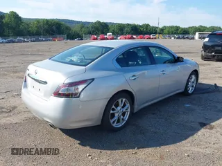 2014 Nissan Maxima SV with VIN 1N4AA5AP3EC481223, listed as a IAAI auction lot 39807318 with 106,882 mi miles and . Bid and sale history available at DreamBid. Image 4.