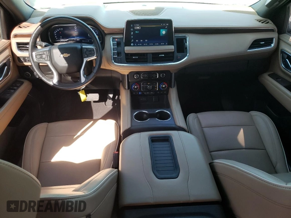 2023 Chevrolet Tahoe Premier with VIN 1GNSCSKD6PR119132, listed as a Copart auction lot 74594664 with 27,716 mi miles and Salvage title. Bid and sale history available at DreamBid. Image 8.