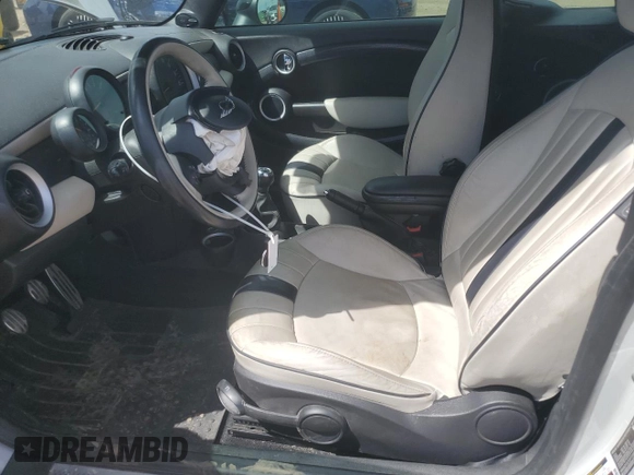 2015 MINI Convertible S z VIN WMWZP3C52FT298857, wystawiony jako Copart lot #58149145 z przebiegiem 52 777 mil mil oraz Szkoda całkowita • Salvage title. Historia ofert i sprzedaży dostępna na DreamBid. Obrazek 7.
