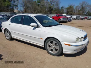 2002 Jaguar X-Type with VIN SAJEA51C22WC27350, listed as a IAAI auction lot 41778528 with 163,600 mi miles. Bid and sale history available at carsss.com. Image 1.