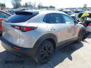 2022 Mazda CX-30 2.5 Turbo Premium Package with VIN 3MVDMBDY2NM408844, listed as a IAAI auction lot 41668027 with 17,463 mi miles. Bid and sale history available at carsss.com. Image 4.