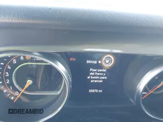 2023 Jeep Gladiator Overland z VIN 1C6HJTFG2PL523686, wystawiony jako IAAI lot #42134627 z przebiegiem 33 575 mil mil oraz . Historia ofert i sprzedaży dostępna na DreamBid. Obrazek 7.