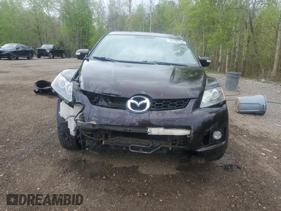 2009 Mazda CX-7 Grand Touring z VIN JM3ER293090234230, wystawiony jako Copart lot #56998155 z przebiegiem 157 432 mil mil oraz Tytuł czysty. Historia ofert i sprzedaży dostępna na DreamBid. Obrazek 5.