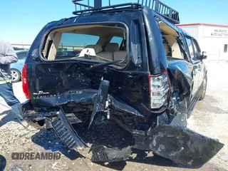 2011 Chevrolet Suburban LTZ with VIN 1GNSKKE33BR380376, listed as a IAAI auction lot 41825445 with 228,715 mi miles and . Bid and sale history available at DreamBid. Image 4.