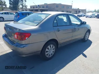 2004 Toyota Corolla CE with VIN 1NXBR32E64Z303089, listed as a IAAI auction lot 42147550 with 232,062 mi miles. Bid and sale history available at carsss.com. Image 4.