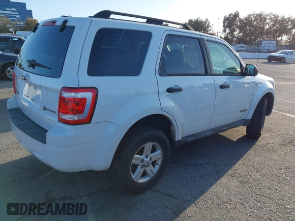 2008 Ford Escape Hybrid with VIN 1FMCU49H78KA37964, listed as a IAAI auction lot 41590572 with 139,830 mi miles and . Bid and sale history available at DreamBid. Image 4.