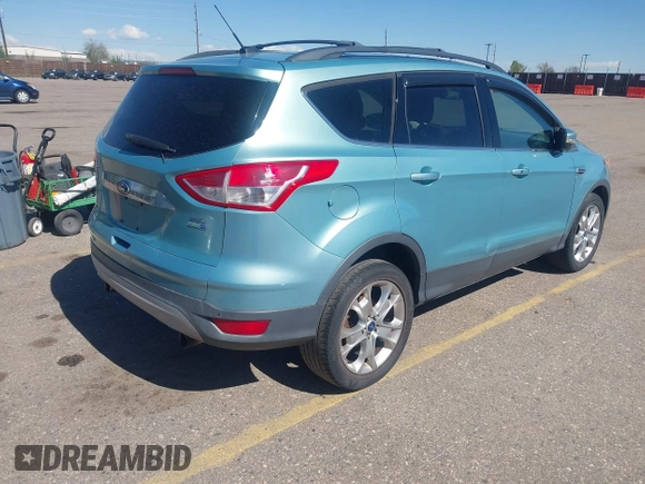 2013 Ford Escape SEL with VIN 1FMCU9HX4DUB95893, listed as a IAAI auction lot 42167435 with 142,016 mi miles. Bid and sale history available at carsss.com. Image 4.
