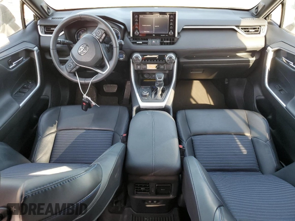 2021 Toyota RAV4 Hybrid XSE with VIN 2T3E6RFV1MW018990, listed as a Copart auction lot 64043865 with 55,938 mi miles and Salvage title. Bid and sale history available at DreamBid. Image 8.