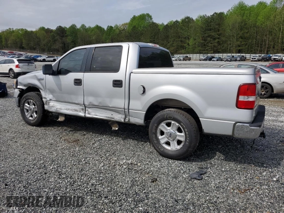 2005 Ford F-150 XLT with VIN 1FTRW12WX5FA79128, listed as a Copart auction lot 51963585 with 169,045 mi miles and Salvage Title. Bid and sale history available at carsss.com. Image 2.