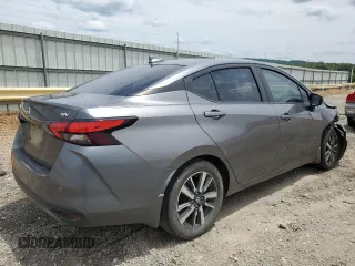 2021 Nissan Versa SV with VIN 3N1CN8EV3ML880947, listed as a Copart auction lot 60303965 with 98,646 mi miles and Salvage title. Bid and sale history available at DreamBid. Image 3.