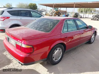 1999 Cadillac Seville Luxury SLS with VIN 1G6KS54Y8XU937328, listed as a IAAI auction lot 41204894 with 282,968 mi miles. Bid and sale history available at carsss.com. Image 4.