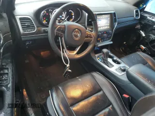2017 Jeep Grand Cherokee Overland with VIN 1C4RJFCG4HC730861, listed as a Copart auction lot 62918825 with 77,228 mi miles and Salvage title. Bid and sale history available at DreamBid. Image 8.