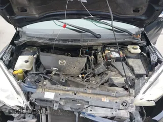 2015 Mazda 5 Touring with VIN JM1CW2CL0F0191196, listed as a IAAI auction lot 41288822 with 159,011 mi miles. Bid and sale history available at carsss.com. Image 10.