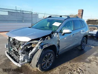 2024 Toyota RAV4 Hybrid XLE Premium with VIN JTMB6RFV9RD136938, listed as a IAAI auction lot 41990754 with 18,675 mi miles. Bid and sale history available at carsss.com. Image 2.
