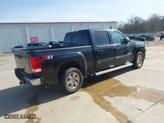 2013 GMC Sierra 1500 SLT with VIN 3GTP2WE71DG146605, listed as a IAAI auction lot 41334159 with 224,640 mi miles. Bid and sale history available at carsss.com. Image 4.