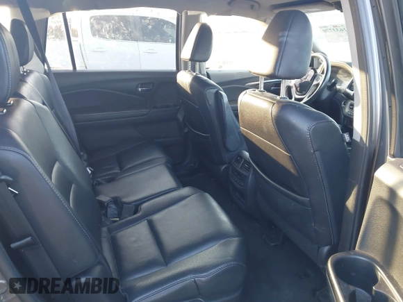2017 Honda Pilot EX-L with VIN 5FNYF5H74HB010026, listed as a IAAI auction lot 41633770 with 170,383 mi miles and . Bid and sale history available at DreamBid. Image 8.