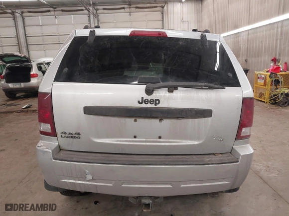 2009 Jeep Grand Cherokee Laredo with VIN 1J8GR48KX9C516873, listed as a IAAI auction lot 41610781 with 199,246 mi miles. Bid and sale history available at carsss.com. Image 16.