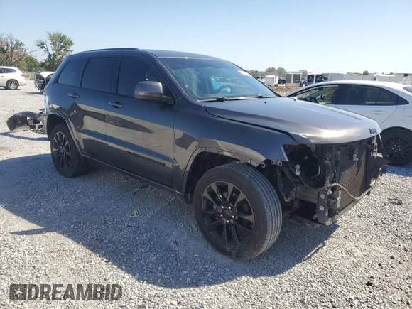 2017 Jeep Grand Cherokee 75th Anniversary with VIN 1C4RJEAG4HC700191, listed as a Copart auction lot 52520655 with 130,828 mi miles and Salvage title. Bid and sale history available at DreamBid. Image 4.