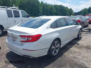 2019 Honda Accord Touring with VIN 1HGCV2F96KA015987, listed as a IAAI auction lot 42528744 with 174,735 mi miles and . Bid and sale history available at DreamBid. Image 4.